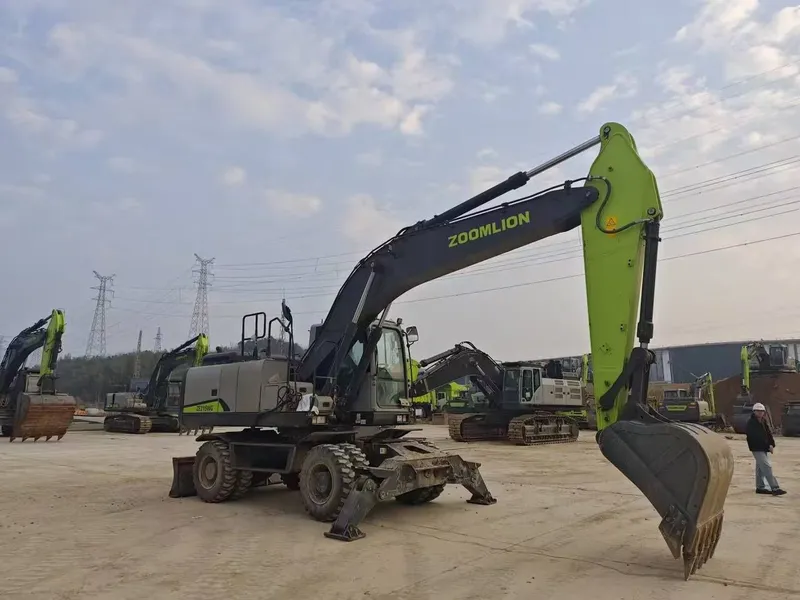 Калёсны экскаватор 215W 1 Калёсны экскаватор 215W 1