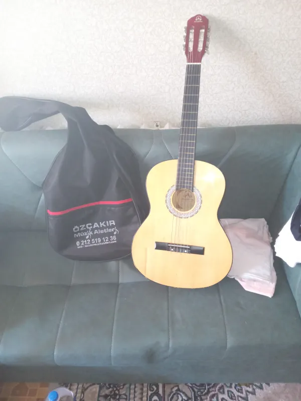 gitara yangi akustika simini almashtirish kere 1 gitara yangi akustika simini almashtirish kere 1
