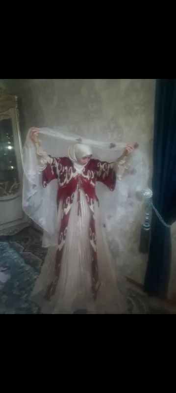 1martta kiyilgan salomi baza koylak chopon bilan — фото 1