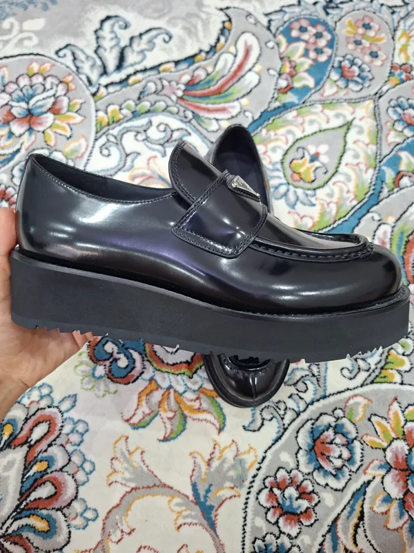 Qora Prada botfortlari 2 Qora Prada botfortlari 2