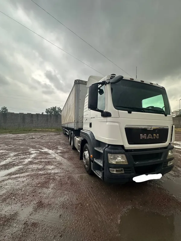 Uz MAN 26/400 тягач прицепи билан