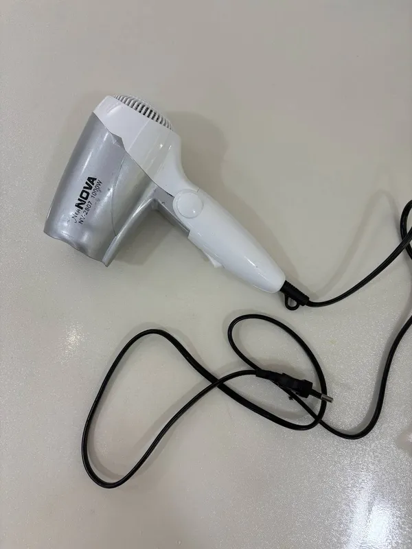 Продам мини-фен Nova NV-2807 мощностью 1000W.