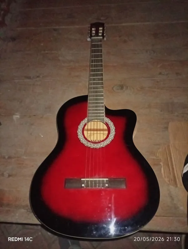 gitara yangi hali birmata chalinmagan