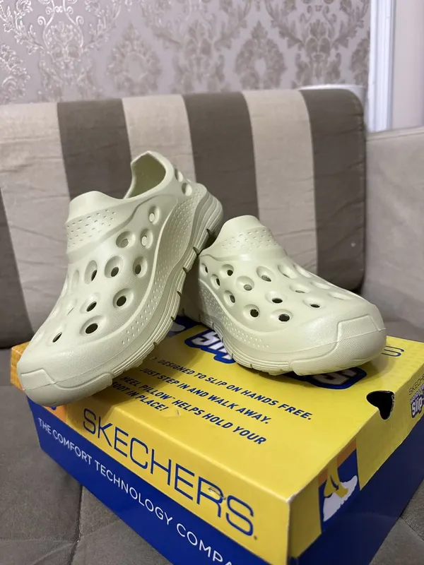 Оригинал кроксы и сланцы от бренда SKECHERS USA — фото 2