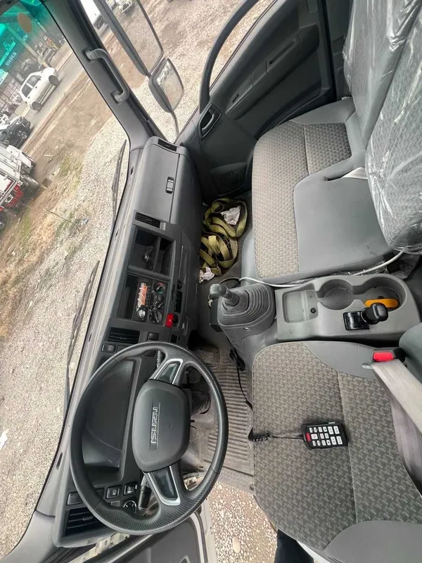 ISUZU ELF KV100 Эвакуатор — фото 4