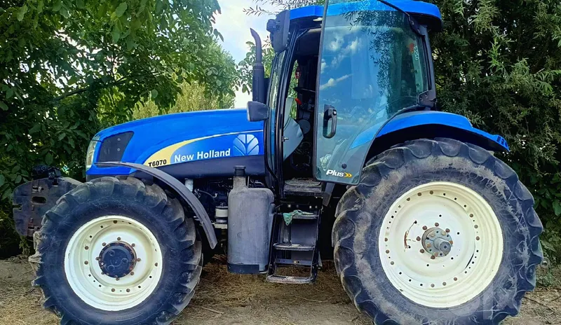 Traktor "New Holland T6070 + 4 korpusli Sukov plugi bilan 3 Traktor "New Holland T6070 + 4 korpusli Sukov plugi bilan 3