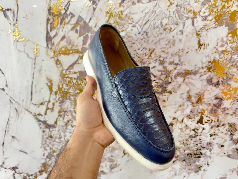Tabiiy piton terisidan poyabzal 1 Tabiiy piton terisidan poyabzal 1