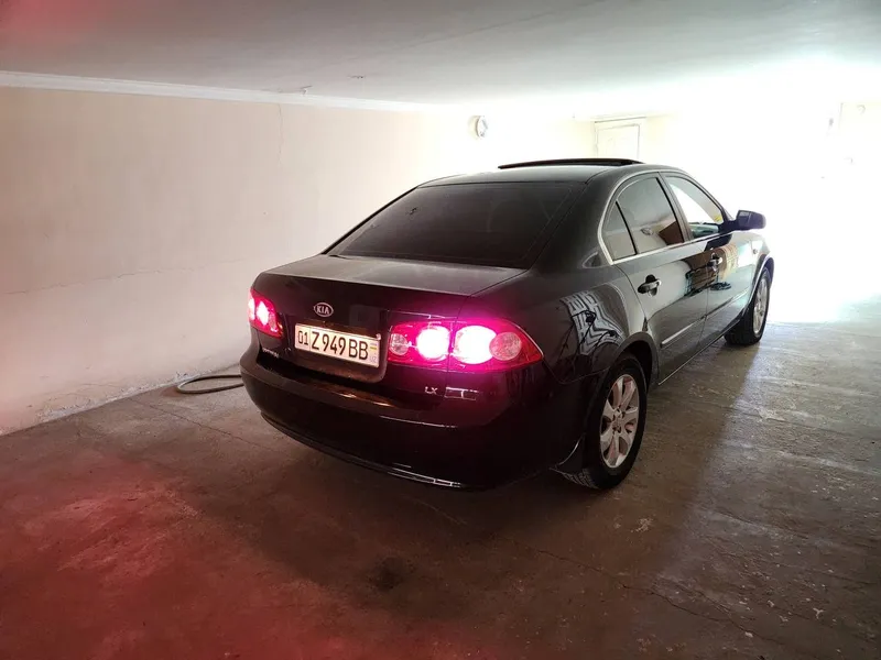 Kia optima — фото 1