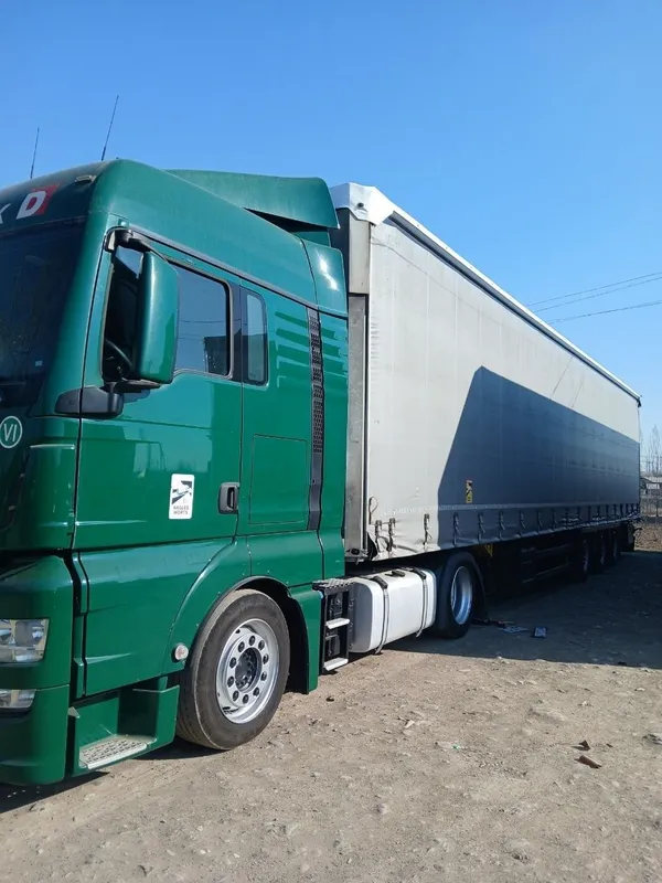 MAN TGX 18.470 + SCHMITZ Прицеп Сотилади