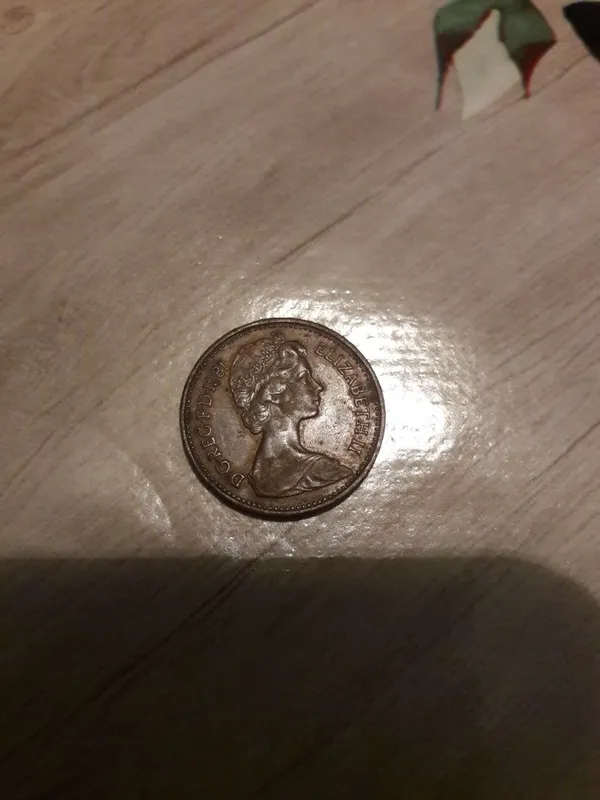 Монета new penny
