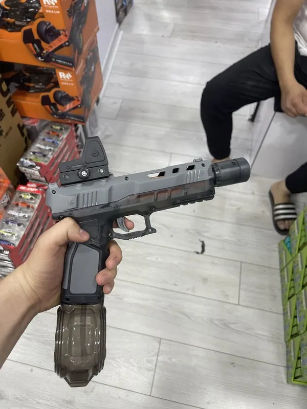Suv pistolet suv sepadigan oyinchoq