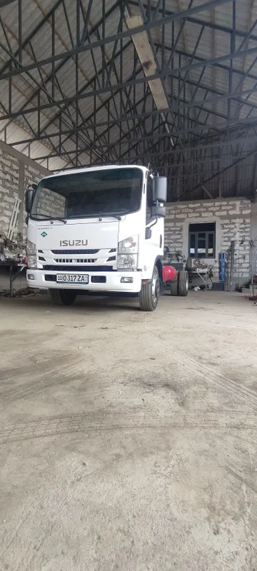 Isuzu avtobusdan yasalgan matori karobka zadni moʻs avtobus 1 Isuzu avtobusdan yasalgan matori karobka zadni moʻs avtobus 1