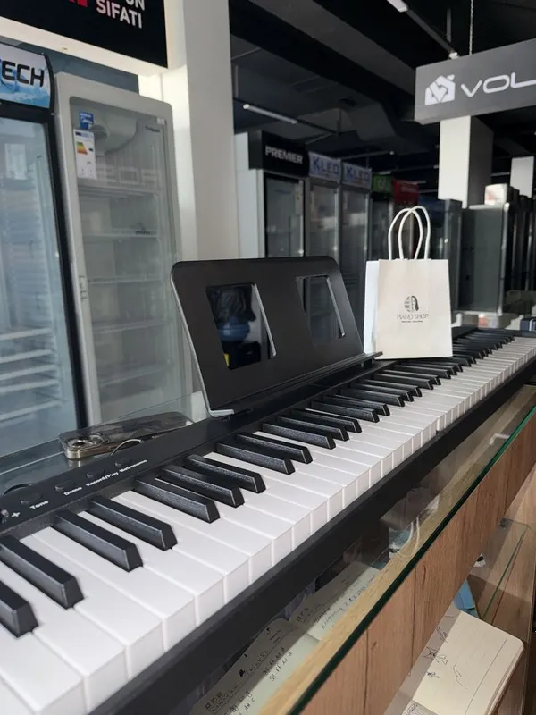Elektron pianino 88 klavishli yangi hamma narsasi qoshb beriladi