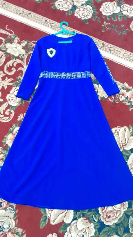 46 razmerda 1 martta kiyilgan holos