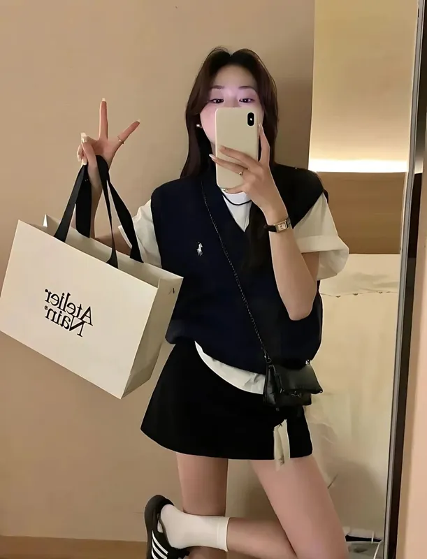Ayollar va qizlar uchun trikotaj jilet