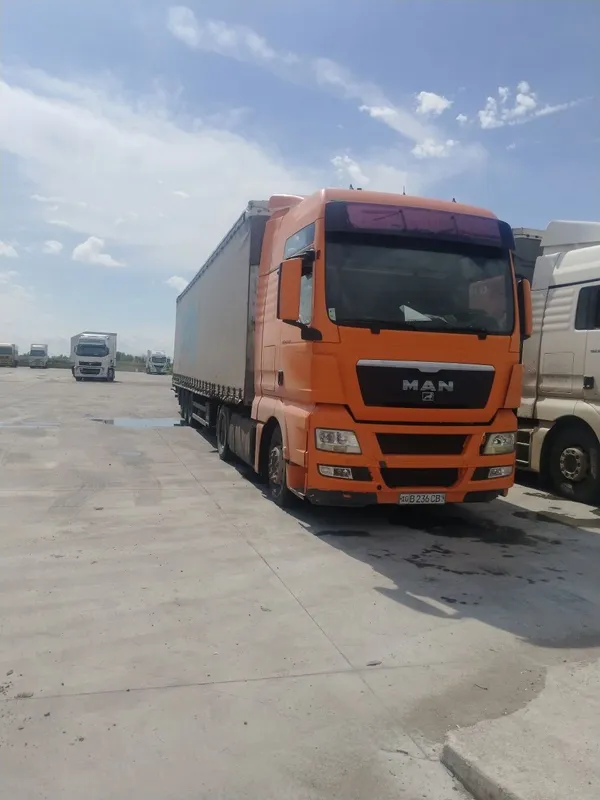 MAN TGX 18.440 + SCHMITZ прицеп Сотилади