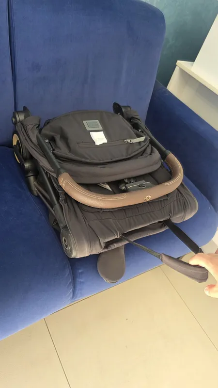 Cybex Coya Platinum с коричневой кожей , чёрный с золотом цвет б.у. 8