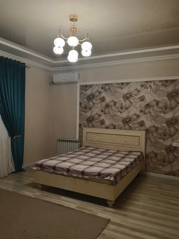 Продается двух этажный дом в махалле Мажнунтол 8