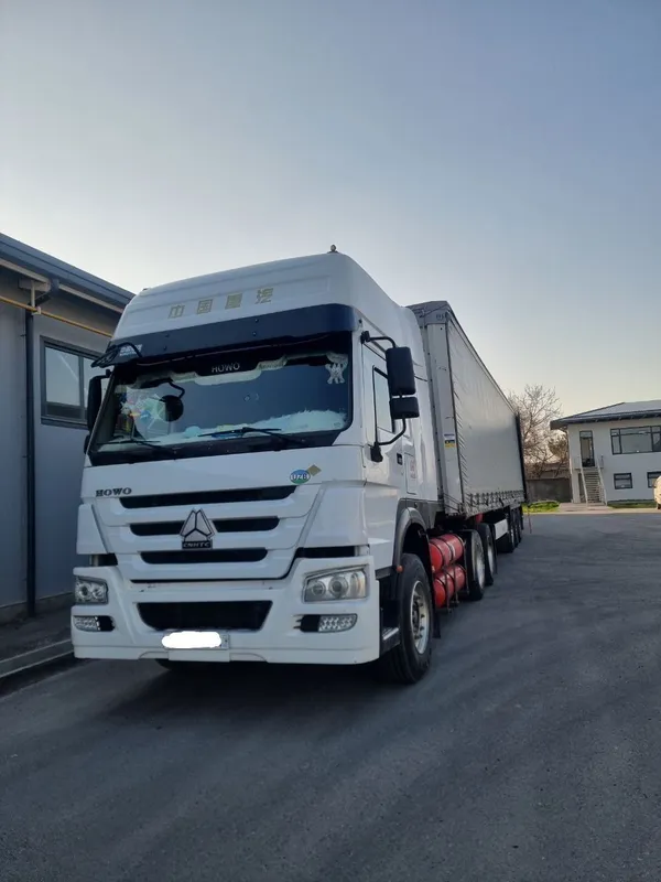 HOWO A6 + KRONE Прицеп Сотилади