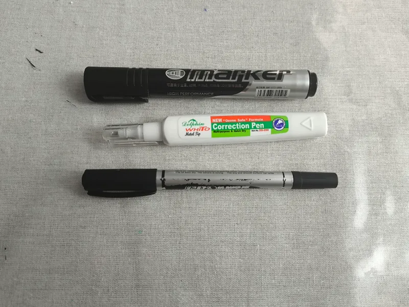 korektor va 2 ta qora marker