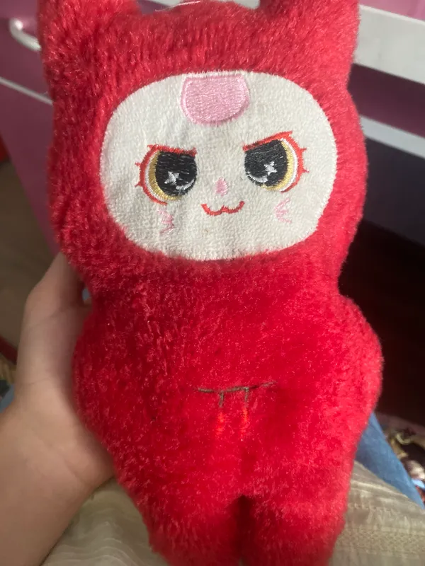 Красная мягкая игрушка