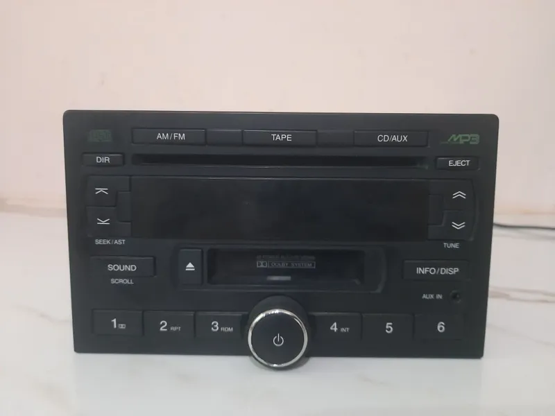 Daewoo/Chevrolet Gentra original magnitola AGK-6390JS (MP3/CD/AUX) 1