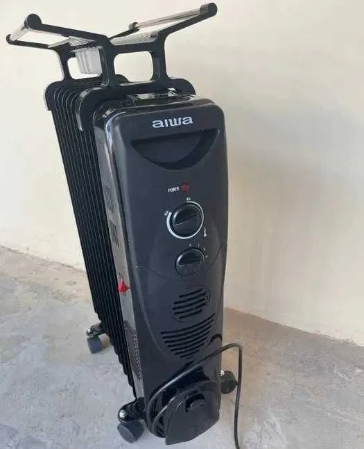 Масляный обогреватель AIWA 1 Масляный обогреватель AIWA 1