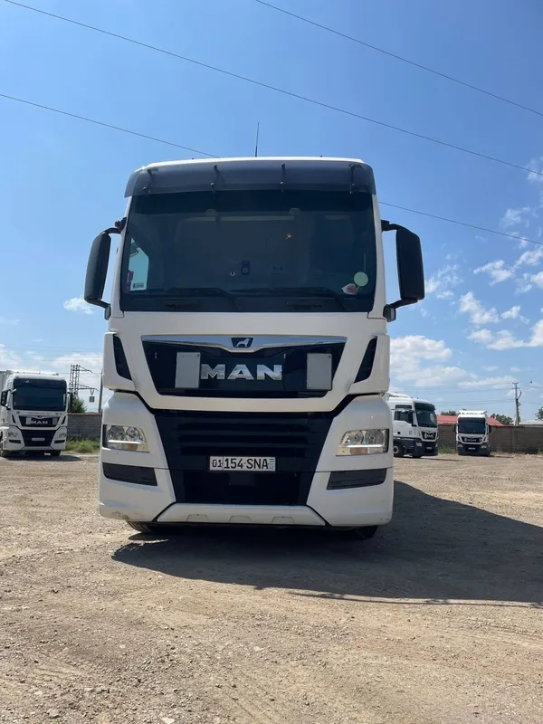 MAN TGX 18.500 EURO 6 + SCHMITZ Прицеп Сотилади 1