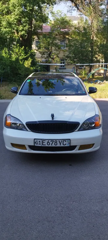 деу Магнус, год:2002