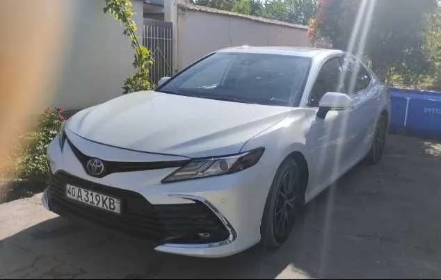 Toyota Camry gibrid — фото 5