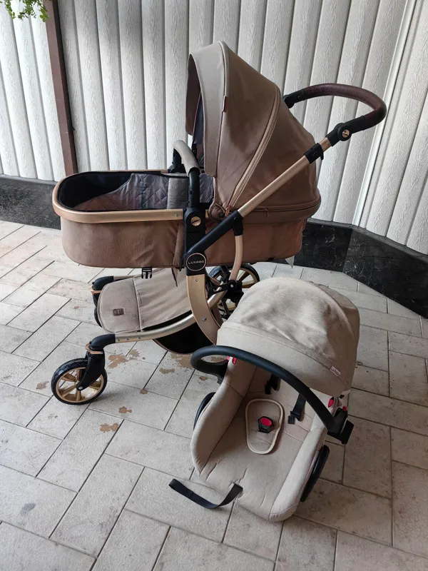 Avtokresloli 2 tasi 1 da Luxmom bolalar aravachasi 1 Avtokresloli 2 tasi 1 da Luxmom bolalar aravachasi 1